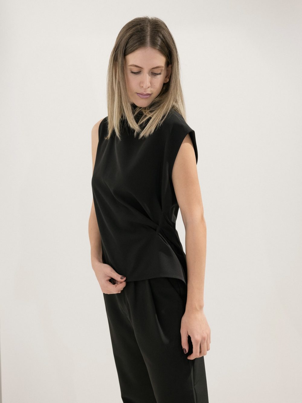 Black Top With Buttons At The Back