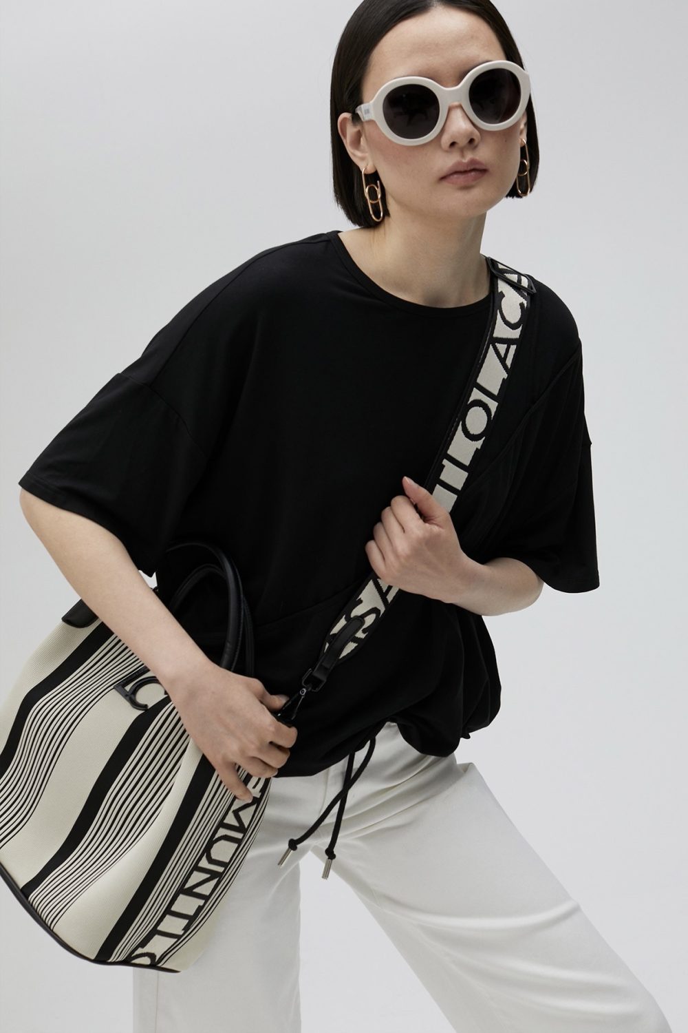 Crossbody Bag with Square Metal Eyelets